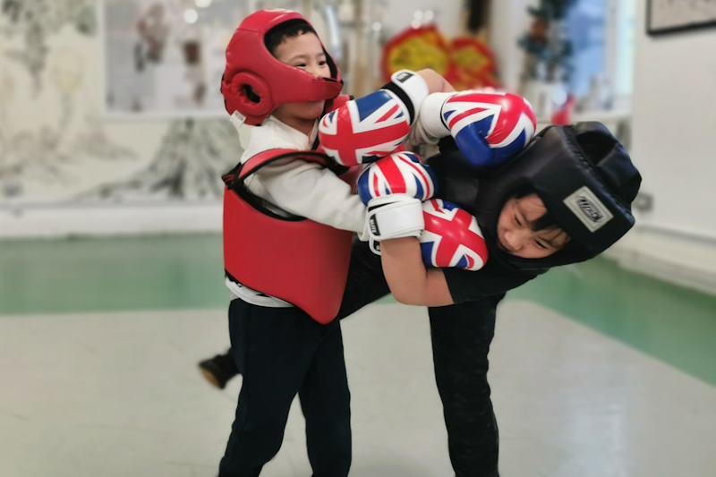 Two children practising in Kickboxing class